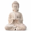 figura buda decorativo en postura de oracion con manos unidas color piedra